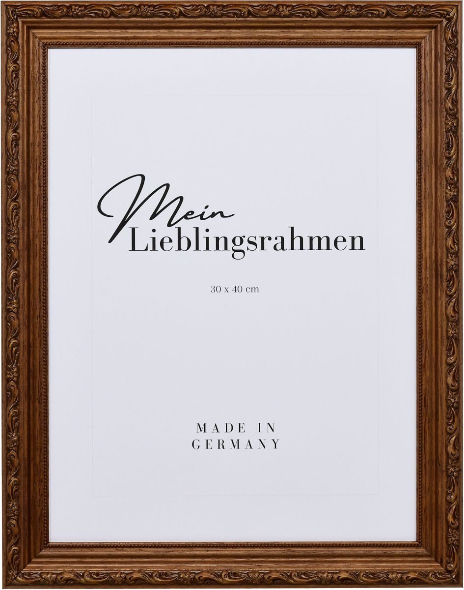 Frontansicht eines braunen Holzrahmens im Barockstil mit rustikaler, nussbaumgebeizter OberflÃ¤che, floralen Ornamenten und einem Perlstab an der Innenkante