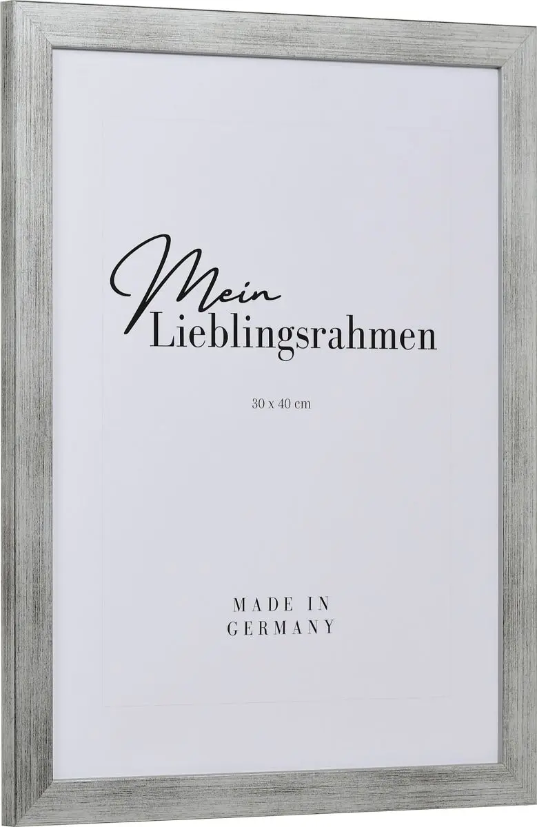 Seitenansicht eines silbernen Bilderrahmens mit sichtbarer Holzstruktur, glatter OberflÃ¤che und kantigem, schlichtem Profil