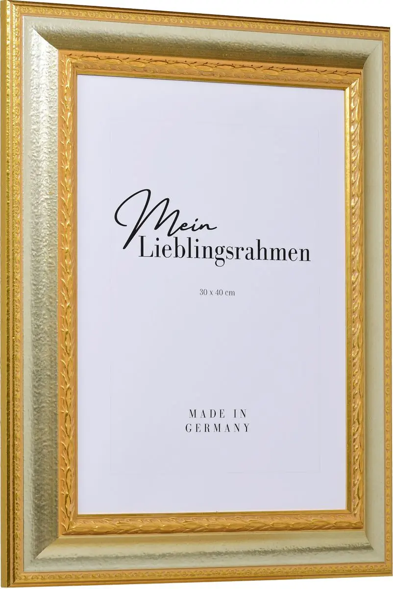 Seitenansicht eines silbernen, pompÃ¶sen Bilderrahmens mit detailreichen Barockapplikationen