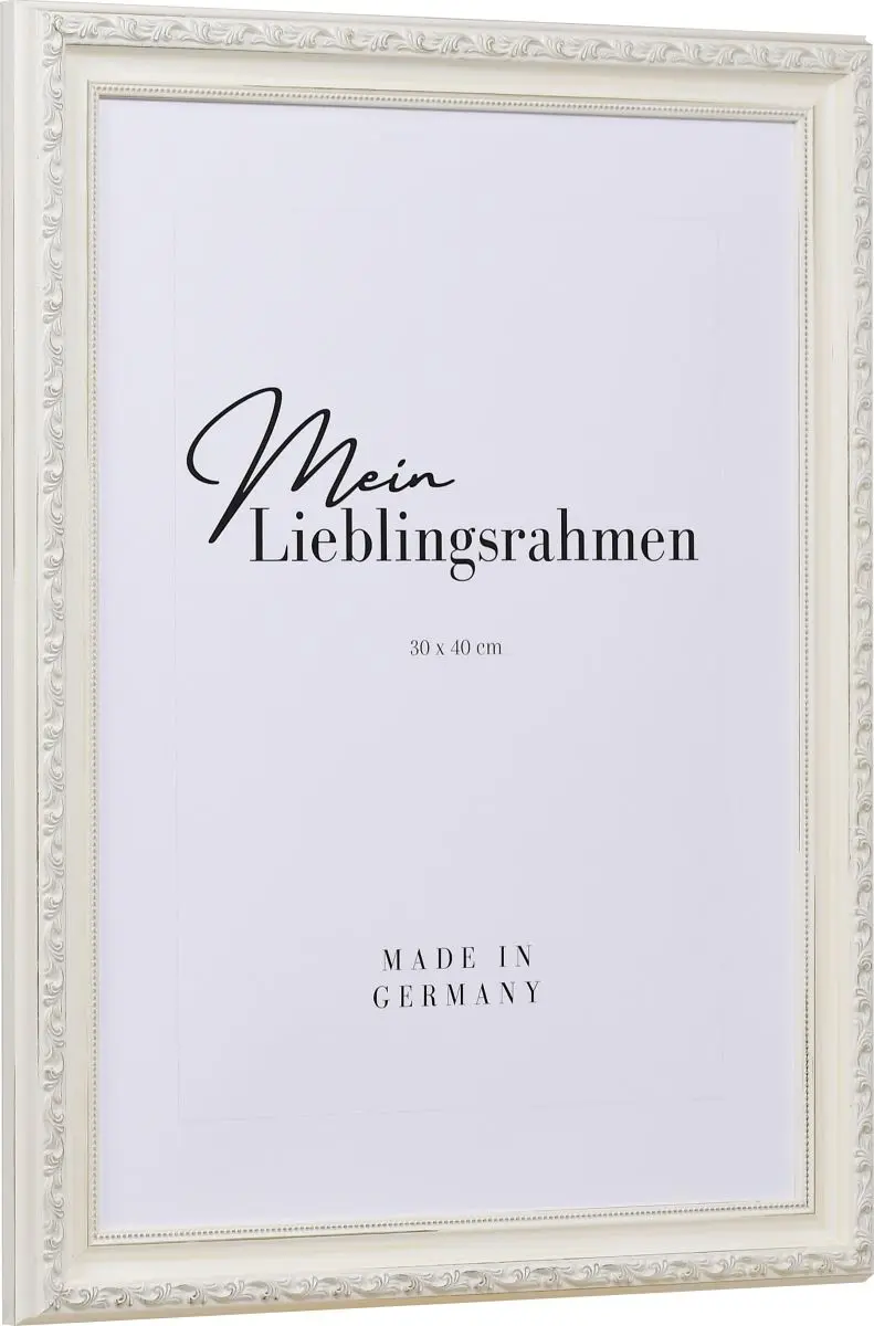 Seitenansicht eines verspielten, weissen, barocken Holzrahmens mit floralen Ornamenten und einen zarten Perlstab