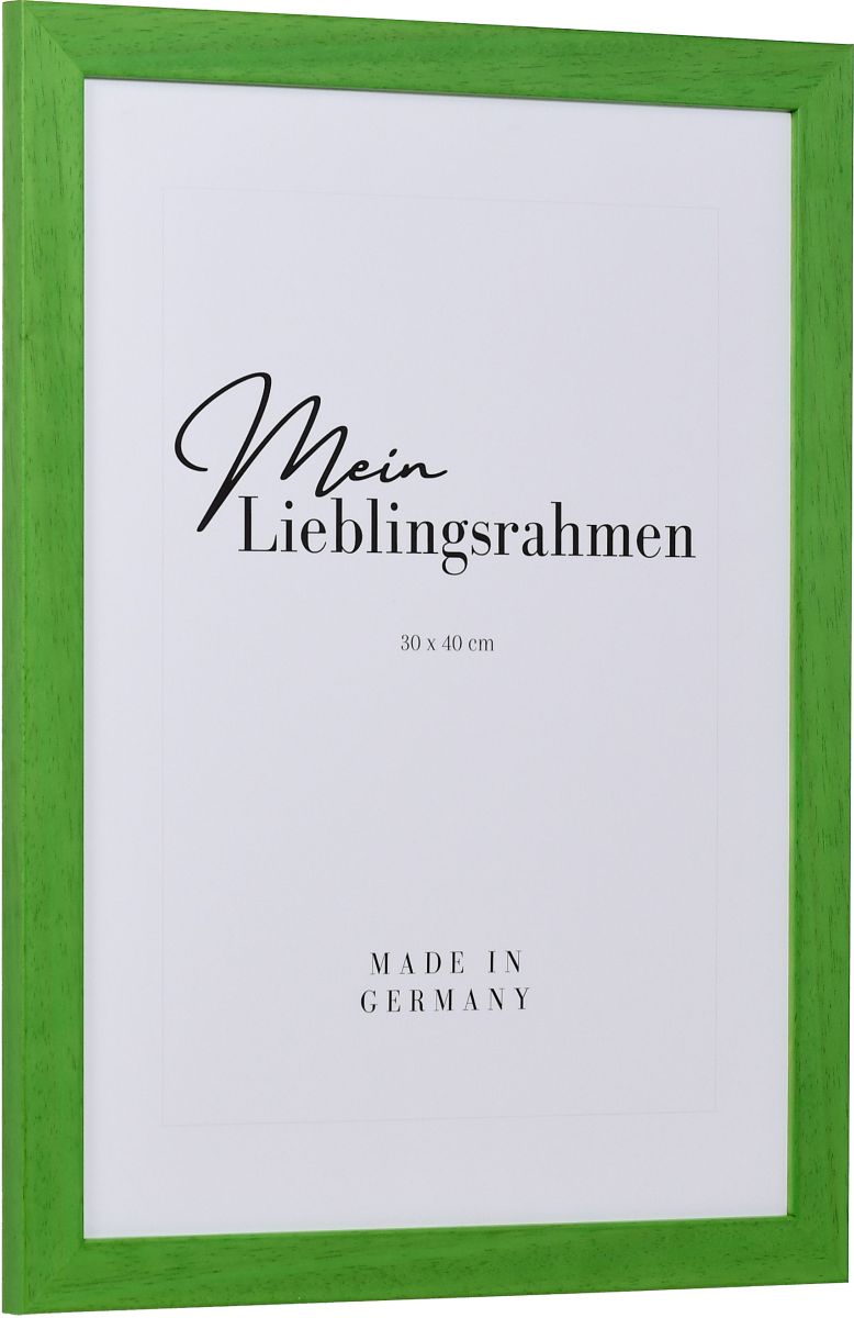 Seitenansicht eines grÃ¼nen Bilderrahmens mit sichtbarer Holzstruktur, glatter OberflÃ¤che und kantigem, schlichtem Profil