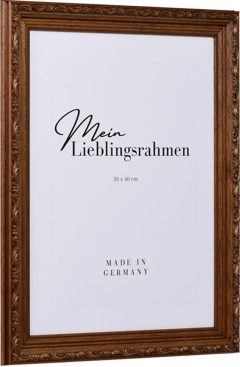 Seitenansicht eines braunen Holzrahmens im Barockstil mit rustikaler, nussbaumgebeizter OberflÃ¤che, leicht schimmernden floralen Ornamenten und einem Perlstab an der Innenkante