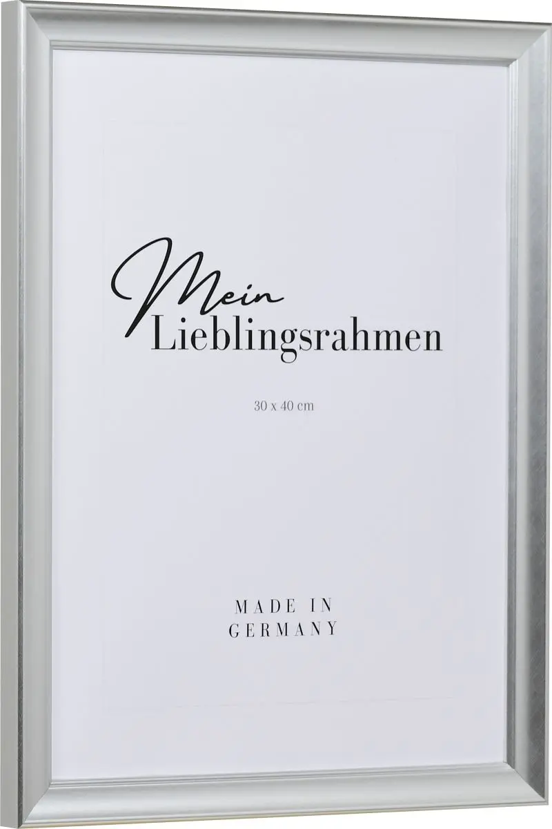 Seitenansicht eines silbernen Bilderrahmens mit einer durch ein PrÃ¤gerad aufgebrachten OberflÃ¤che und einem Perlstab