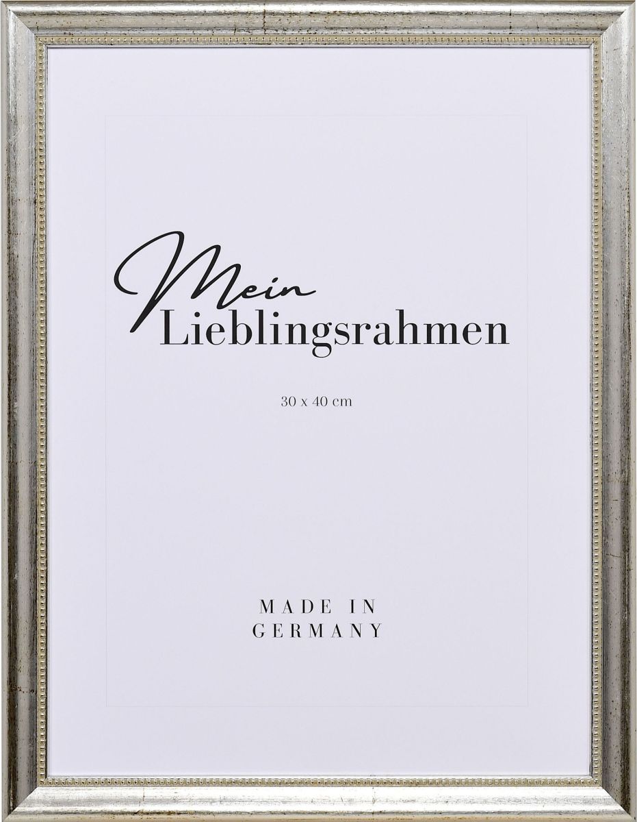 Frontansicht eines silbernen Holzrahmens mit von Hand aufgebÃ¼rsteten Schlagmetall und einem Perlstab an der Innenkante