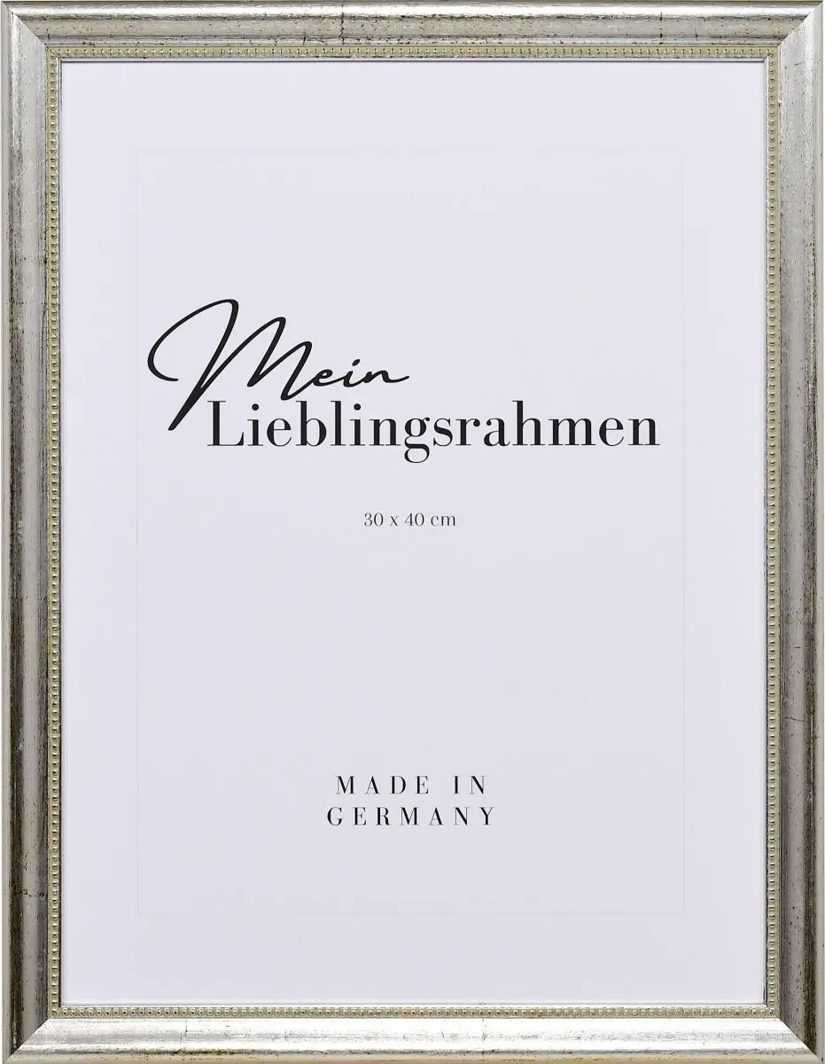 Frontansicht eines silbernen Holzrahmens mit von Hand aufgebÃ¼rsteten Schlagmetall und einem Perlstab an der Innenkante