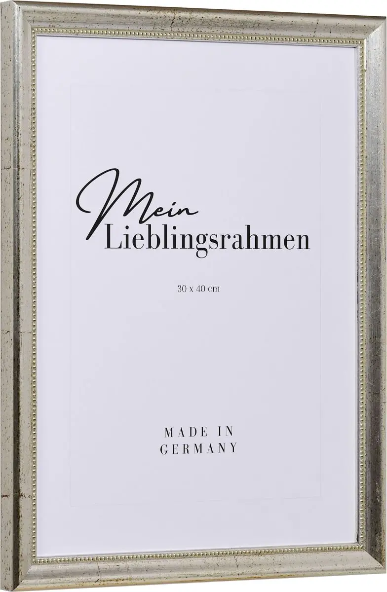 Seitenansicht eines silbernen Holzrahmens mit von Hand aufgebÃ¼rsteten Schlagmetall und einem Perlstab an der Innenkante