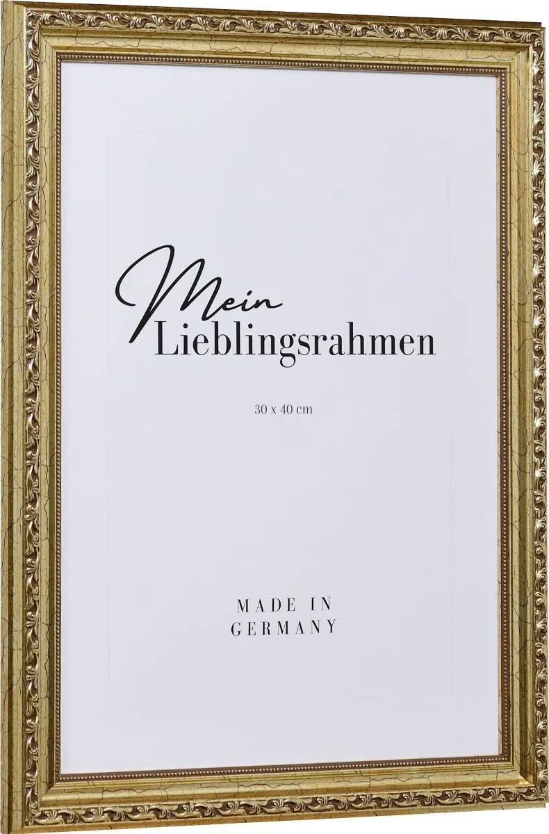 Seitenansicht eines verspielten, antiksilbernen, barocken Holzrahmens mit floralen Ornamenten und einen zarten Perlstab